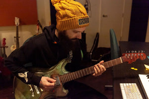 “Perpetual Glimmer” Pompom Cable-Knit Beanie - Golden Yellow