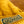 Load image into Gallery viewer, “Perpetual Glimmer” Pompom Cable-Knit Beanie - Golden Yellow
