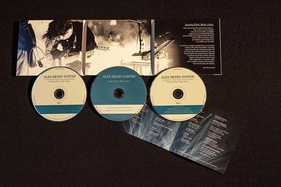 “Standing Under Bright Lights” [Triple LP Vinyl - Widespine - Smoke Orange] Deluxe Bundle